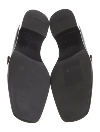 Prada Enameled Metal Triangle Leather Loafers
