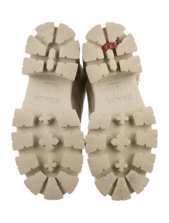 Prada Enameled Metal Triangle Nylon Combat Boots