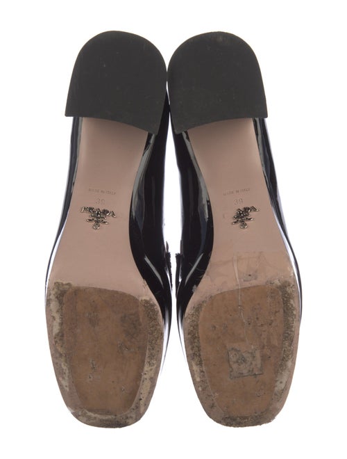 Prada Enameled Metal Triangle Patent Leather Loafers