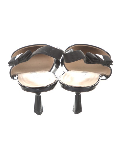 Prada Enameled Metal Triangle Patent Leather Slingback Pumps