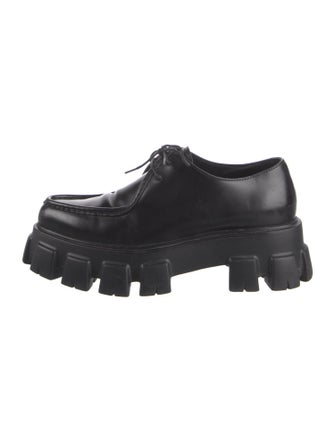 Prada Enameled Metal Triangle Leather Loafers