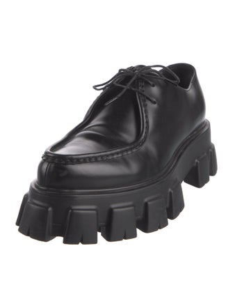 Prada Enameled Metal Triangle Leather Loafers