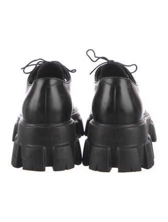 Prada Enameled Metal Triangle Leather Loafers