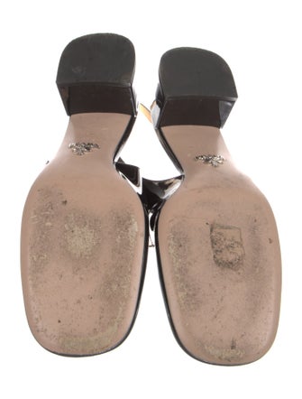 Prada Enameled Metal Triangle Patent Leather Slingback Pumps