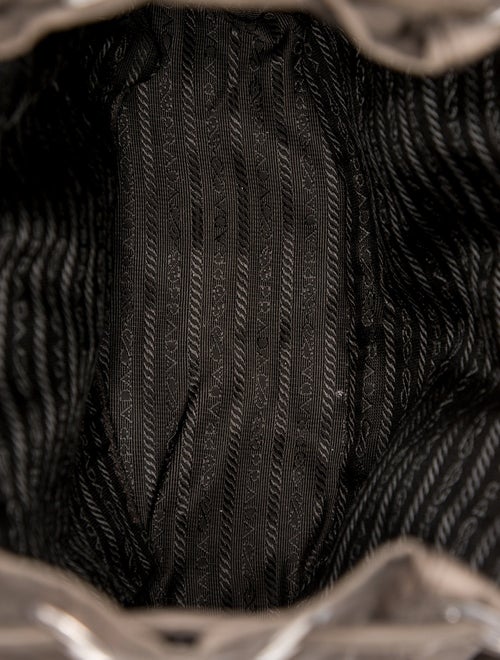 Prada Enameled Metal Triangle Backpack