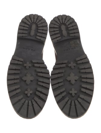 Prada Enameled Metal Triangle Leather Combat Boots