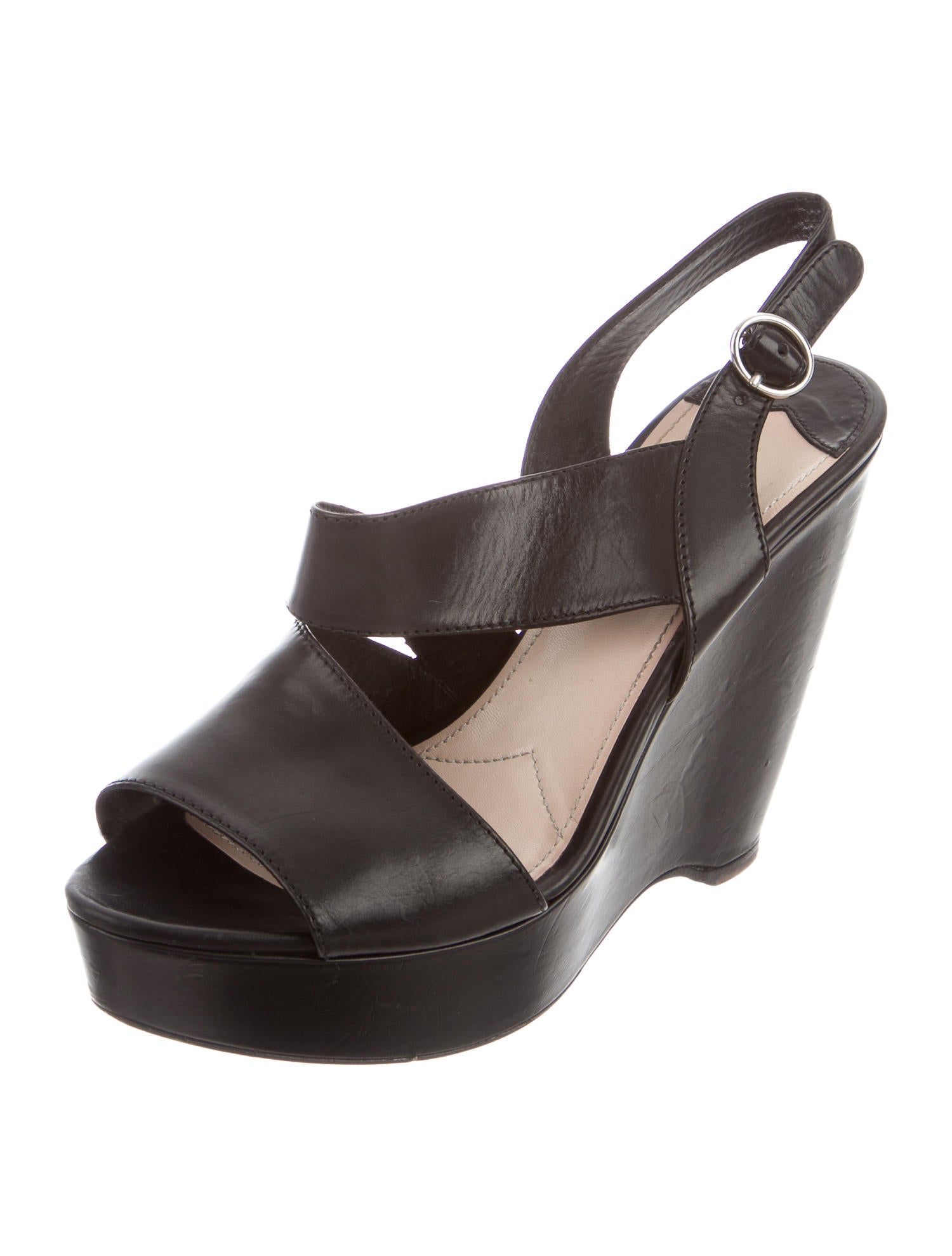 Leather wedge shoes To dress your flats up, try pointed-toe shoes with an animal print or a higher heel. Leather—with a bow or a buckle—is a great accent to a suit or dress, with enough allure to wear more than a few days a week. Looking for the perfect pair of shoes for the office? Pumps are a classic way to accessorize and feel confident about your personal style. Whether you opt for stiletto heels or ankle straps, you can count .