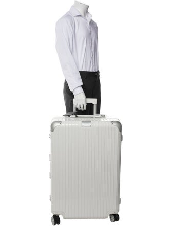 Rimowa Plastic Rolling Suitcase