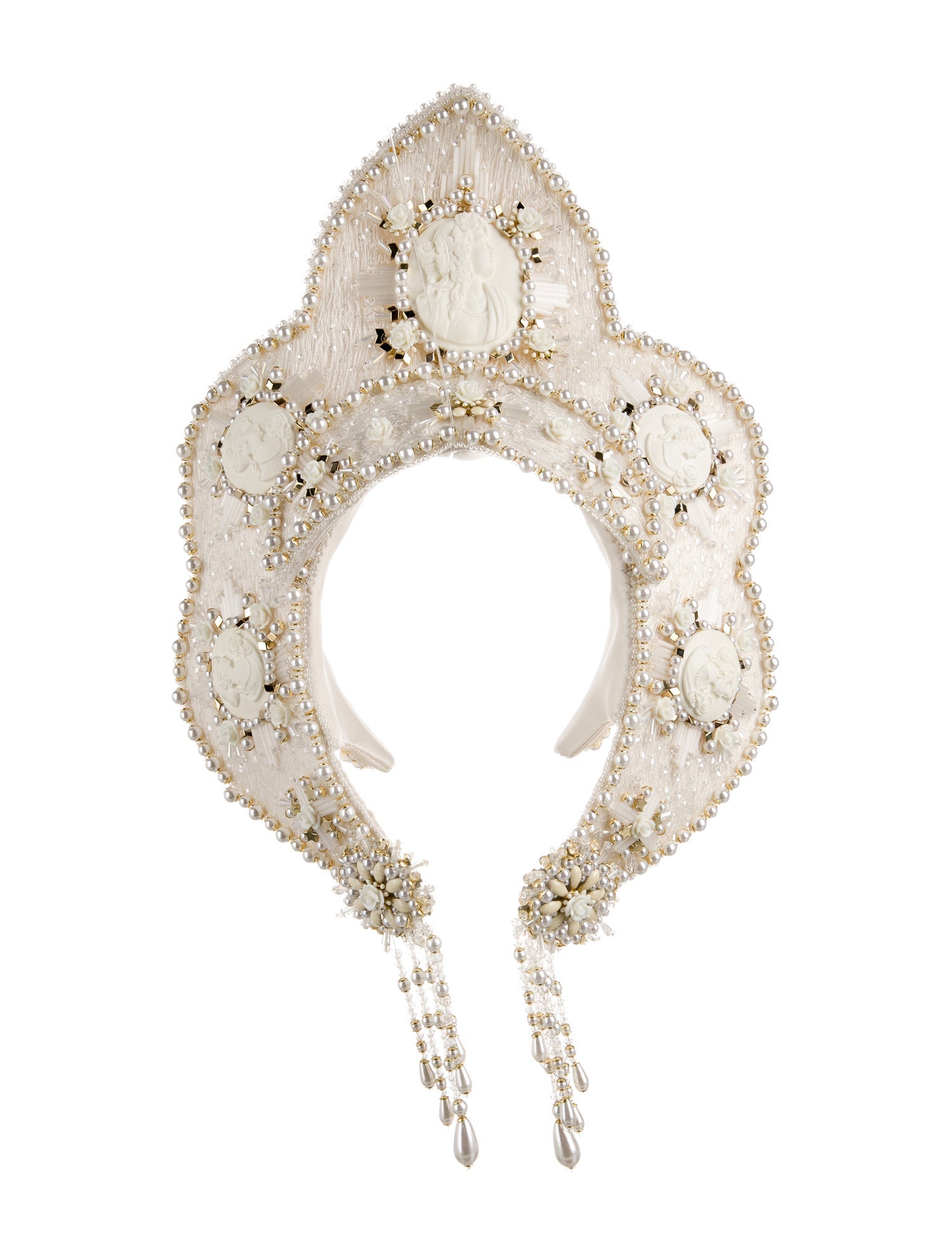 Saiid Kobeisy outlined with pearls and metal shapes.