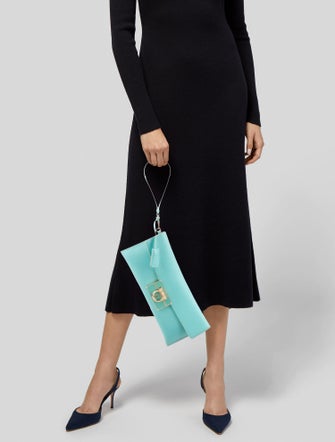 Salvatore Ferragamo Afef Lock Story Wristlet Clutch