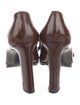 Saint Laurent Patent Leather Bow Accents Pumps