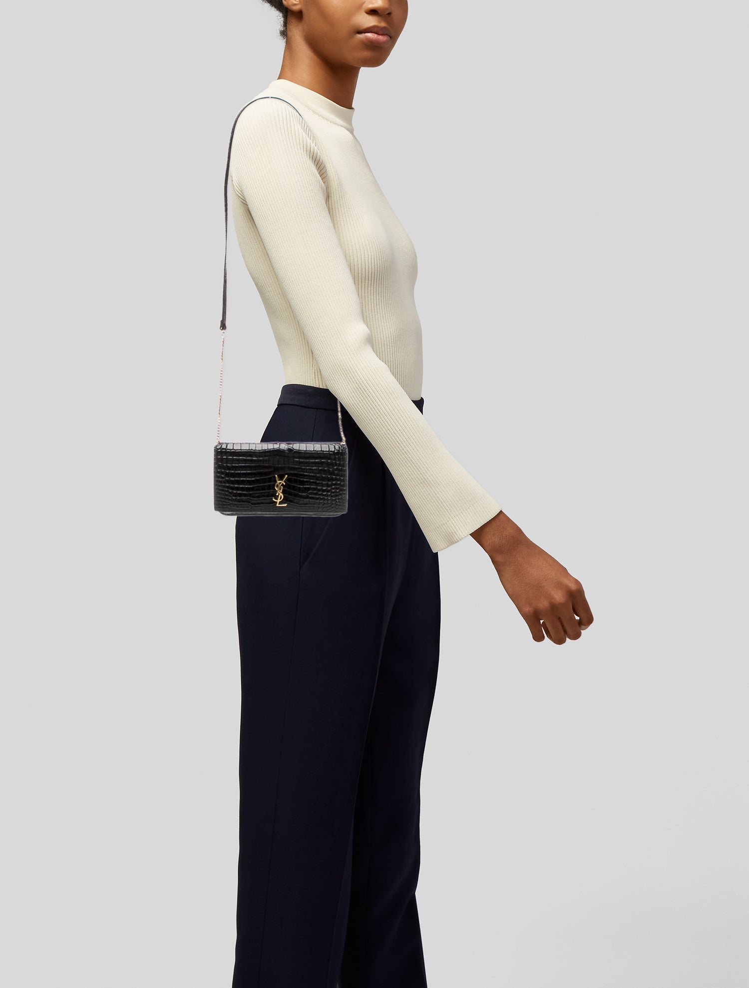 Saint Laurent Embossed Leather Clutch 2023