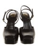 Saint Laurent La Scandale Leather Slingback Pumps