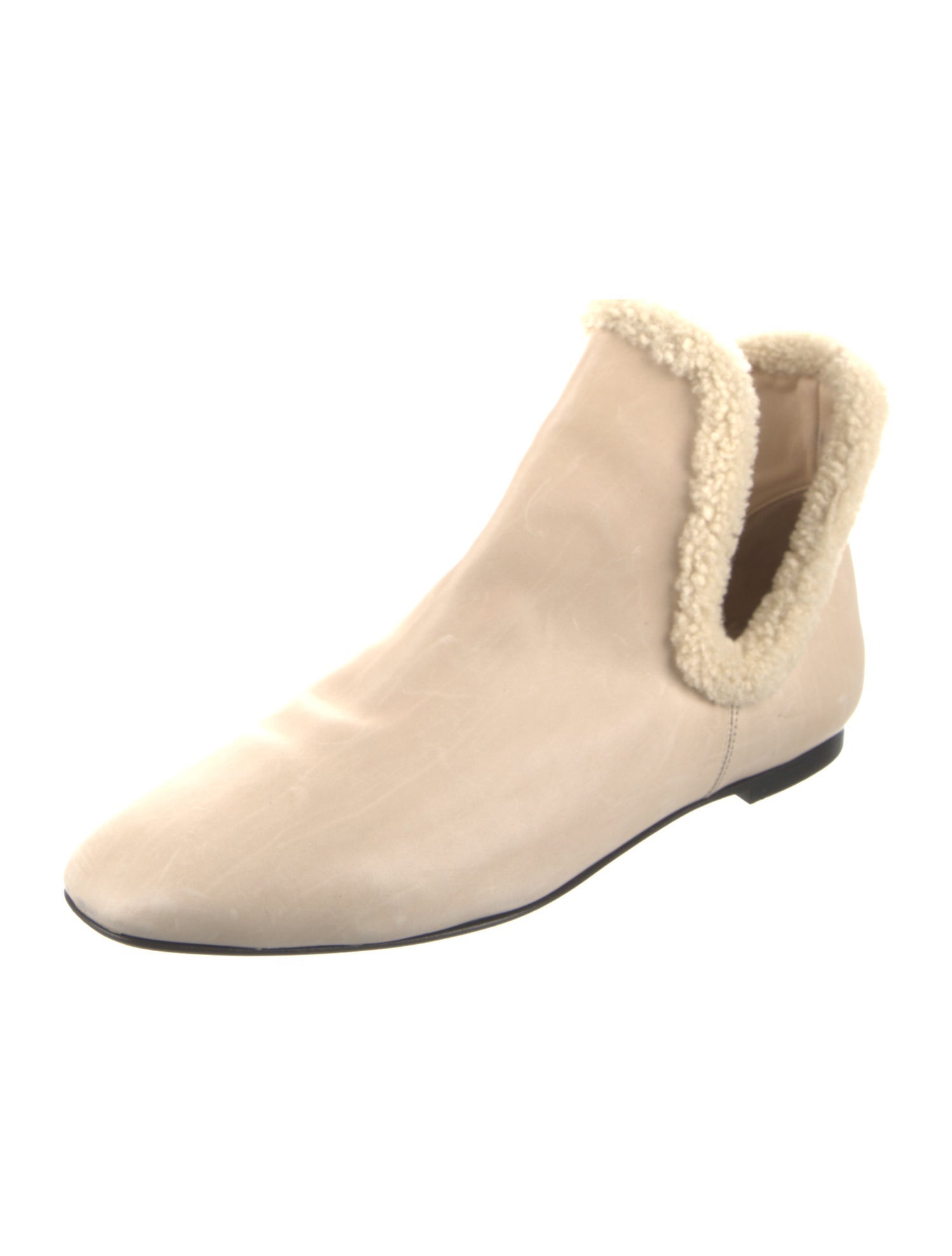 The Row Shearling Boots