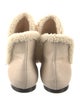 The Row Shearling Boots