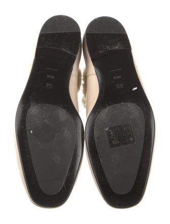 The Row Shearling Boots