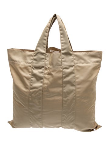 Click to view more detailed imagery on our partner's website Pre-owned The Row Nylon Sam In Neutrals