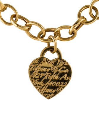 Tiffany & Co. 18K Notes Heart Charm Bracelet