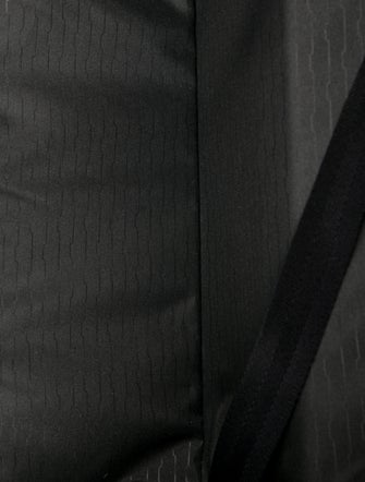 Tumi Canvas Rolling Suitcase