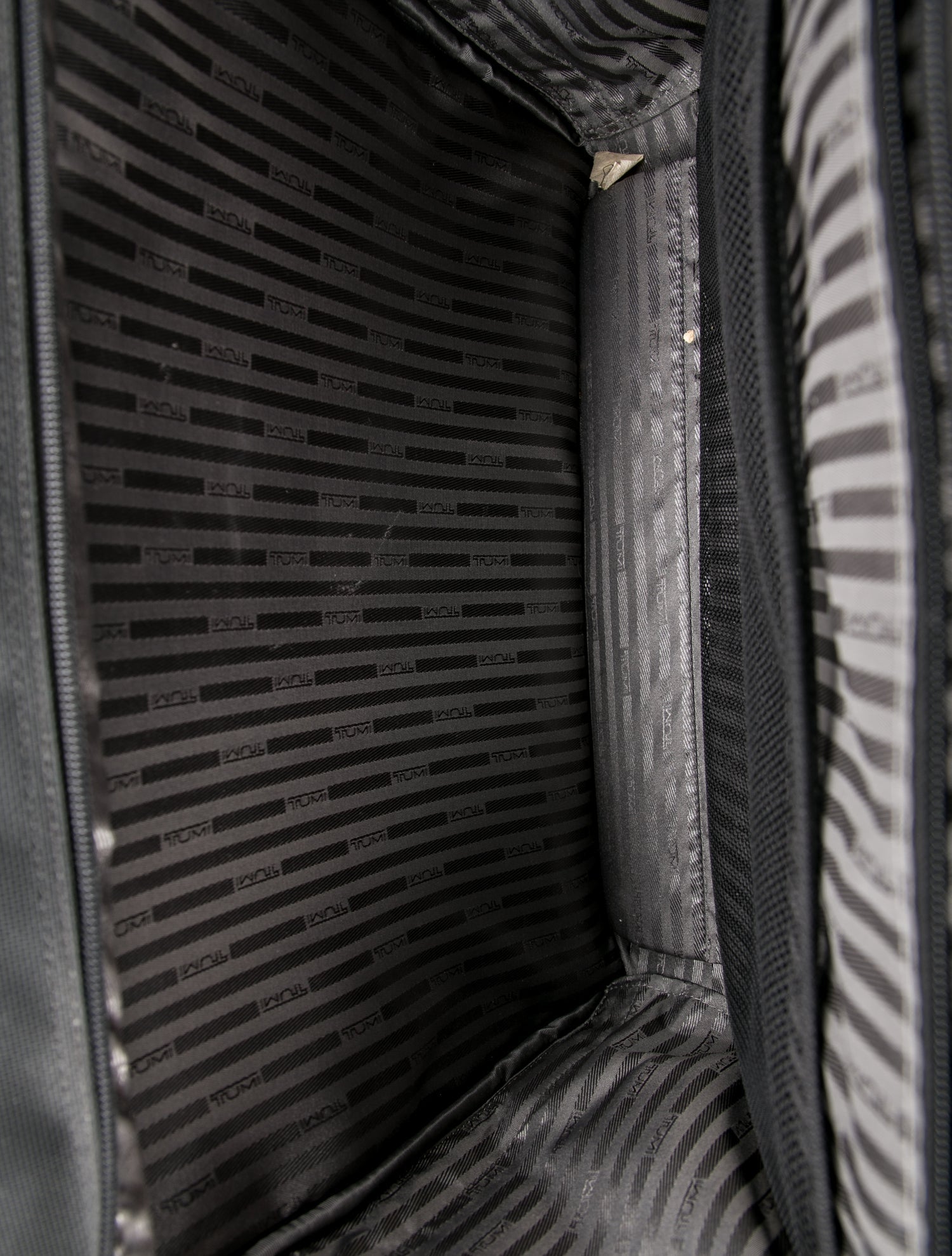 Tumi Canvas Rolling Suitcase