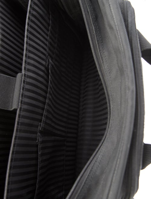 Tumi canvas carry on