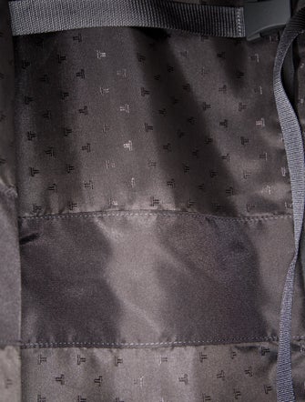 Tumi Canvas Suitcase