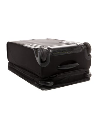 Tumi canvas suitcase