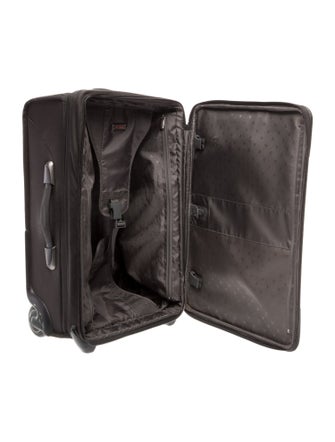 Tumi canvas suitcase