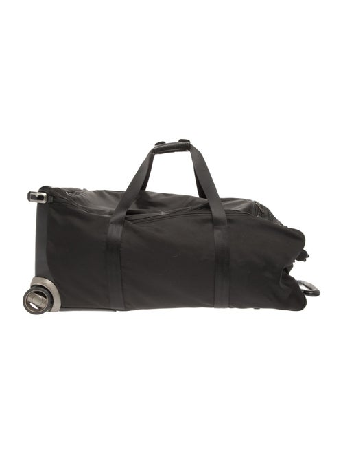 Tumi Canvas Rolling Suitcase