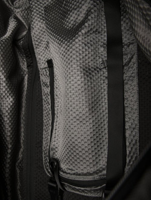 Tumi Canvas Rolling Suitcase