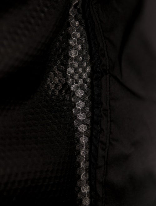 Tumi Canvas Suitcase