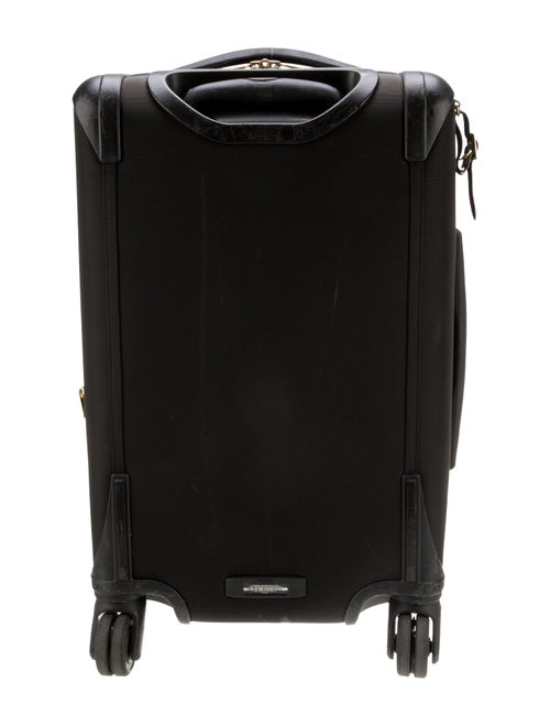 Tumi Canvas Multi-Pocket Suitcase