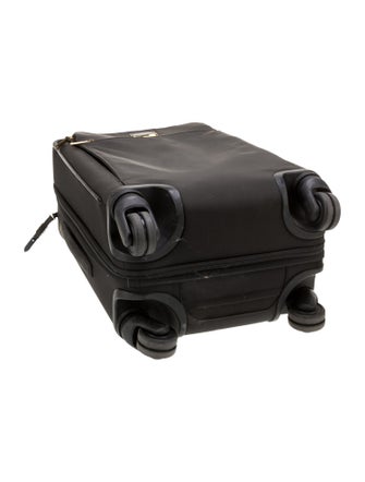 Tumi Canvas Multi-Pocket Suitcase