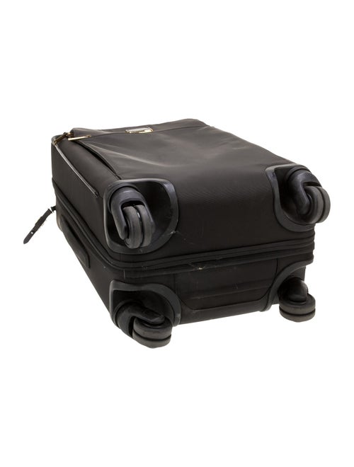 Tumi Canvas Multi-Pocket Suitcase