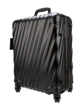 Tumi Metal Rolling Suitcase