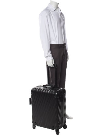 Tumi Metal Rolling Suitcase