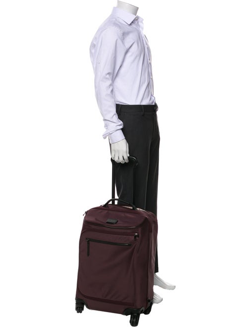 Tumi Purple Suitcase