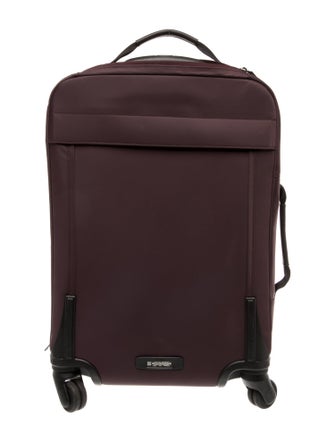Tumi Purple Suitcase