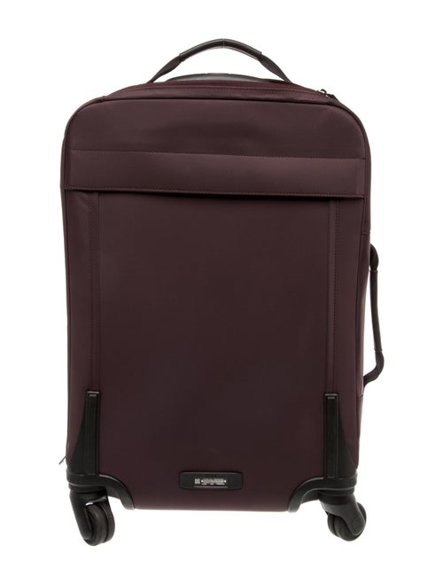 Tumi Purple Suitcase