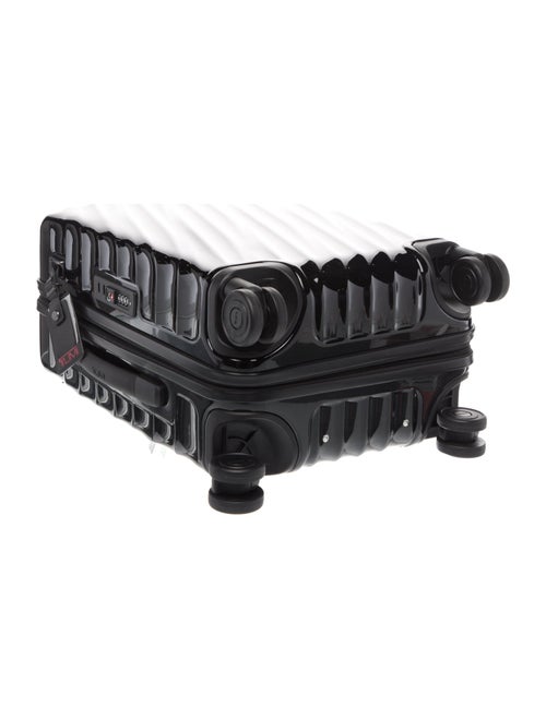 Tumi tumis suitcase
