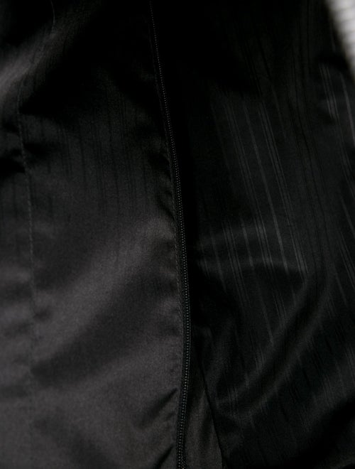 Tumi Solid Rolling Suitcase