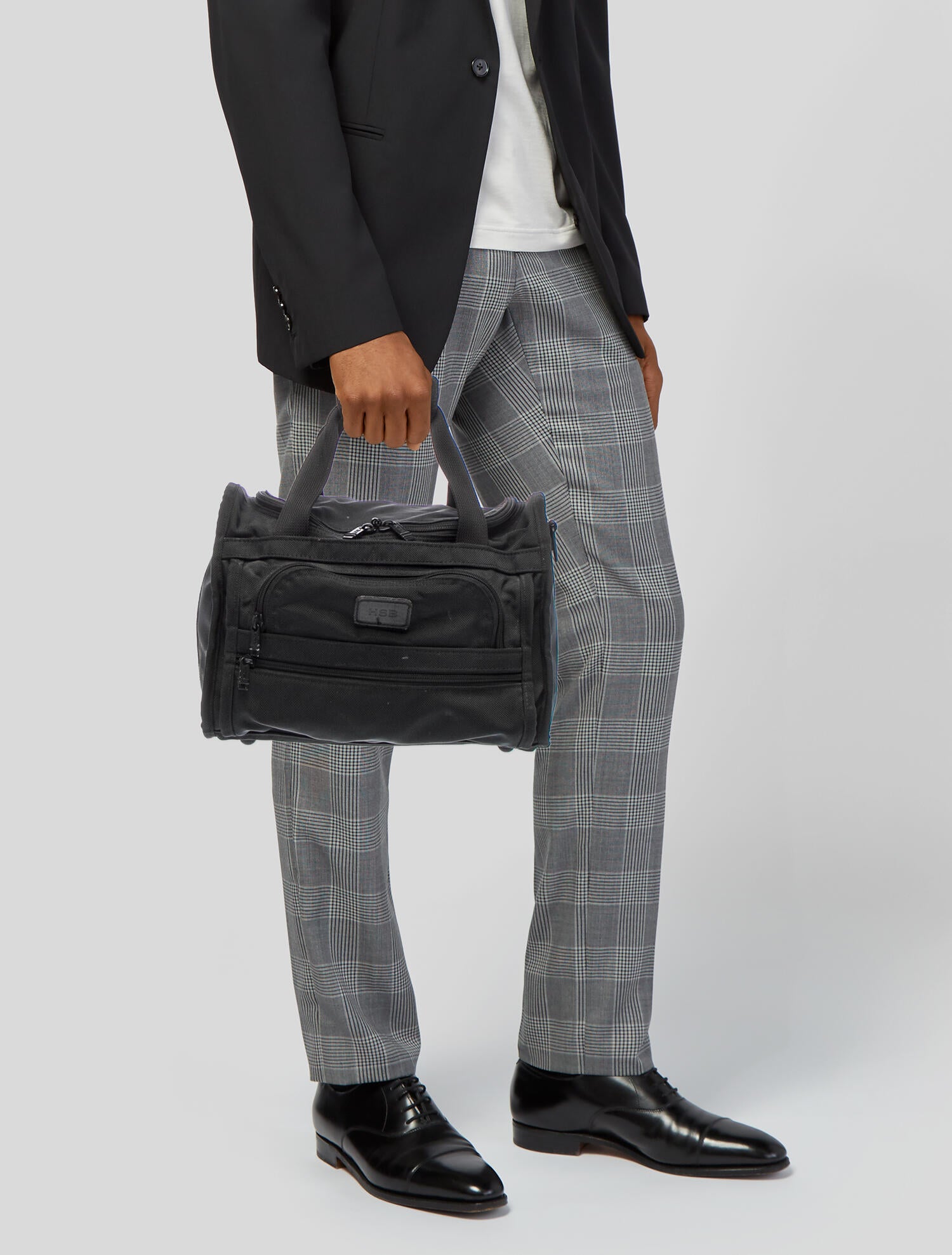 Tumi Men's black carry on duffel bag