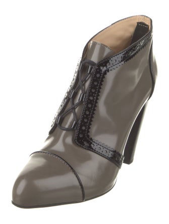 Tod's Patent Leather Lasercut Accents Lace-Up Boots