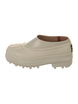 Proenza Schouler x Sorel Rubber Mules