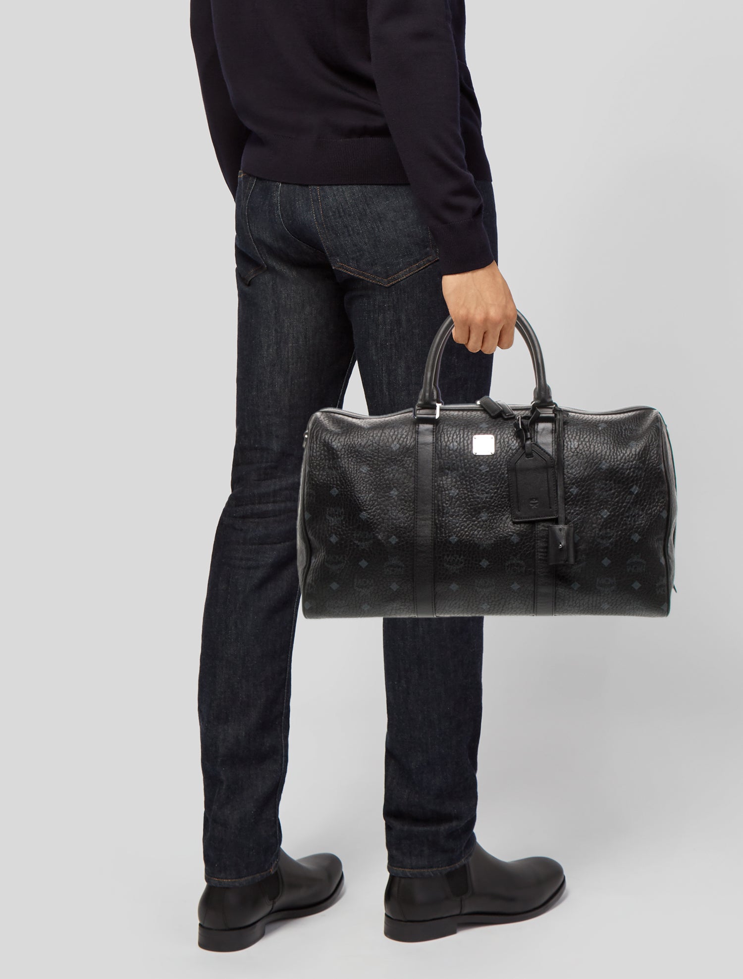 MCM Monogrammed Leather Top Handle Carry On