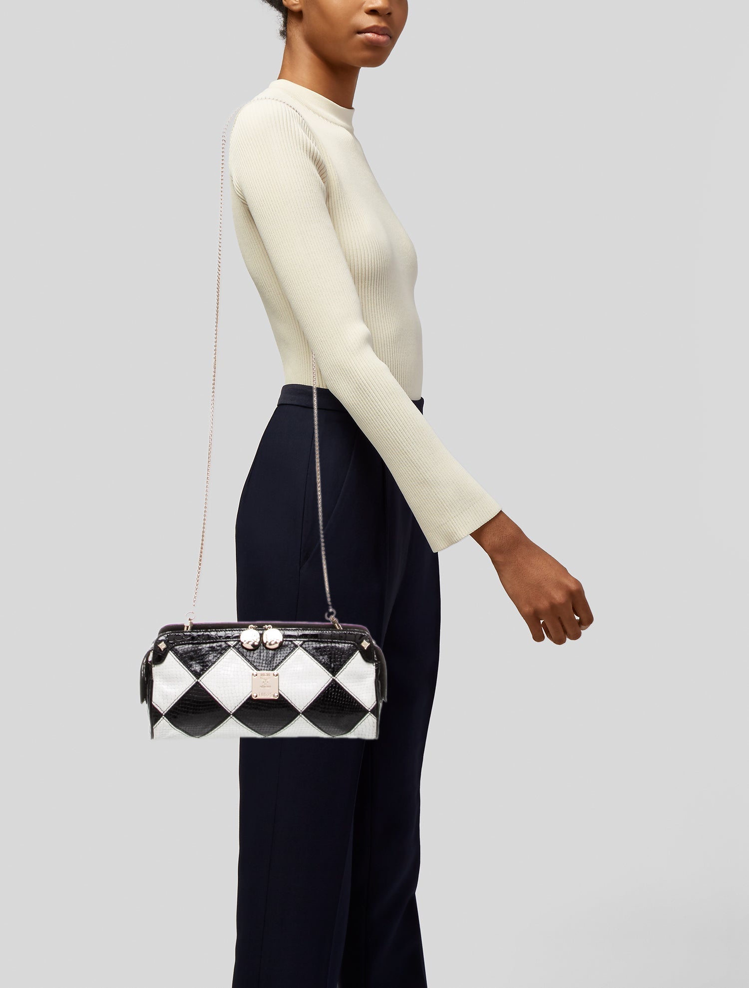 MCM Embossed Leather Clutch