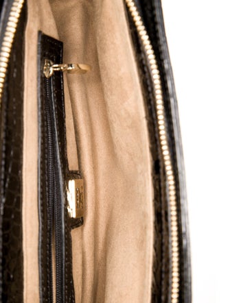 MCM Embossed Leather Clutch