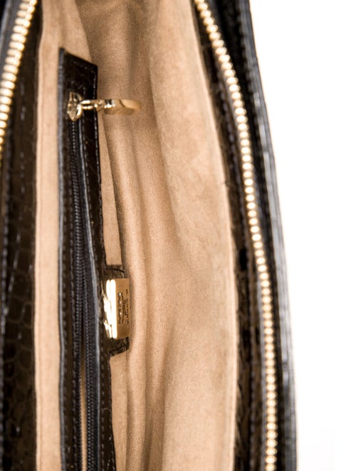 MCM Embossed Leather Clutch