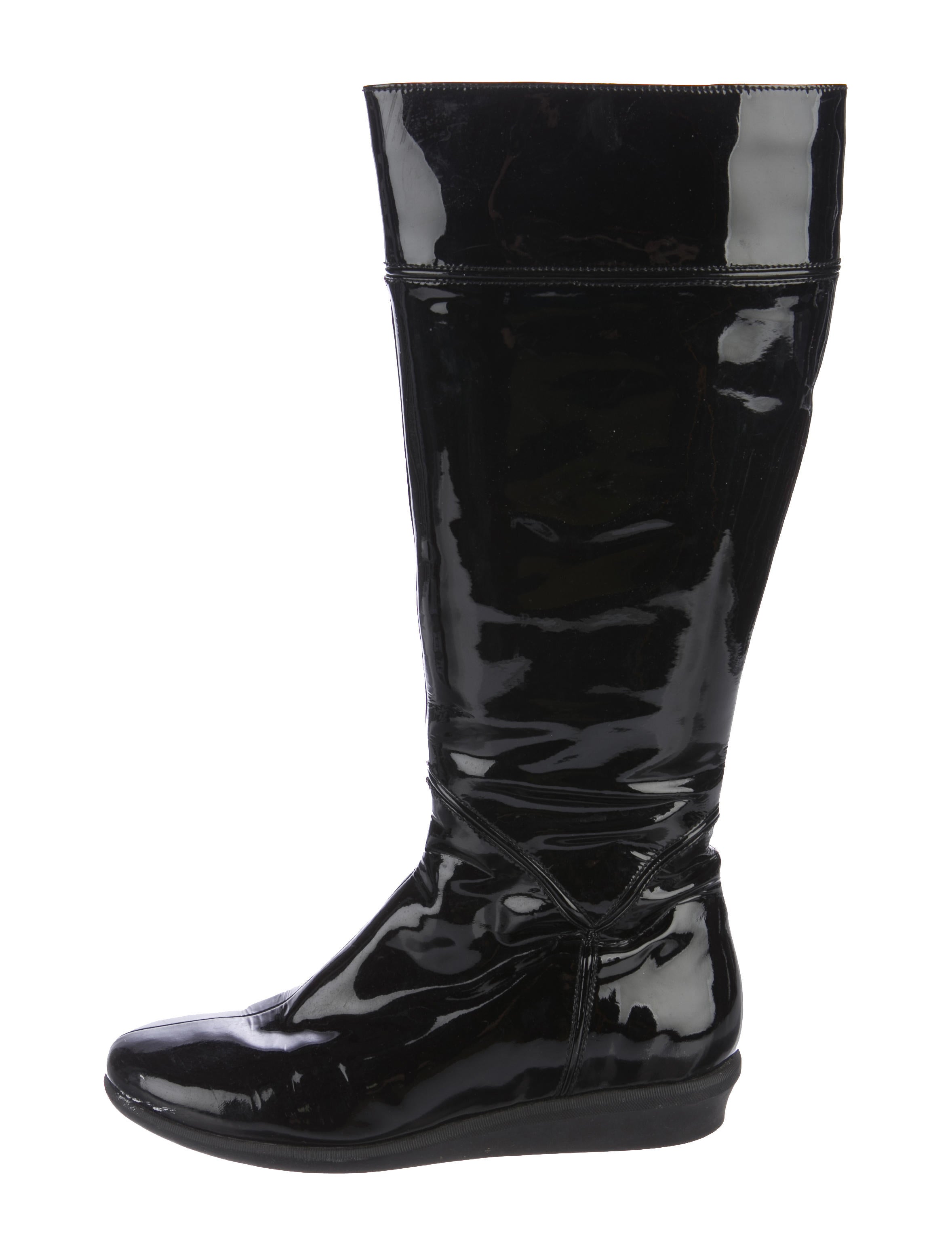 It's free shipping made easy Wedge boots in black leather, black patent almond toe. Black rubber outsoles. 36 FR, insole length 23cm, sole width 8cm, front platform 2cm, upper, 23cm, ankle width 14cm The outer soles are clean, light creases on the leather.