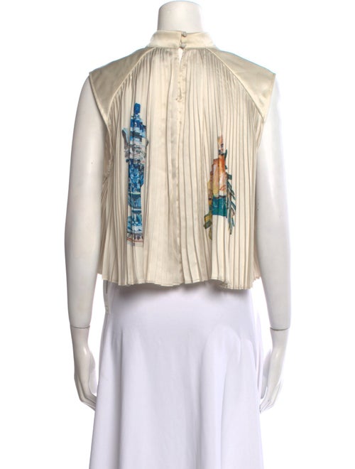 ALÉMAIS Striped Mock Neck Crop Top